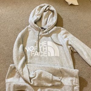 Grey women’s North Face sweatshirt